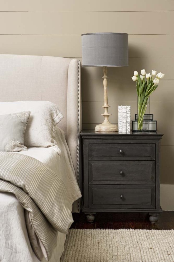 Large elegant master dark wood floor bedroom photo in Charleston with beige walls