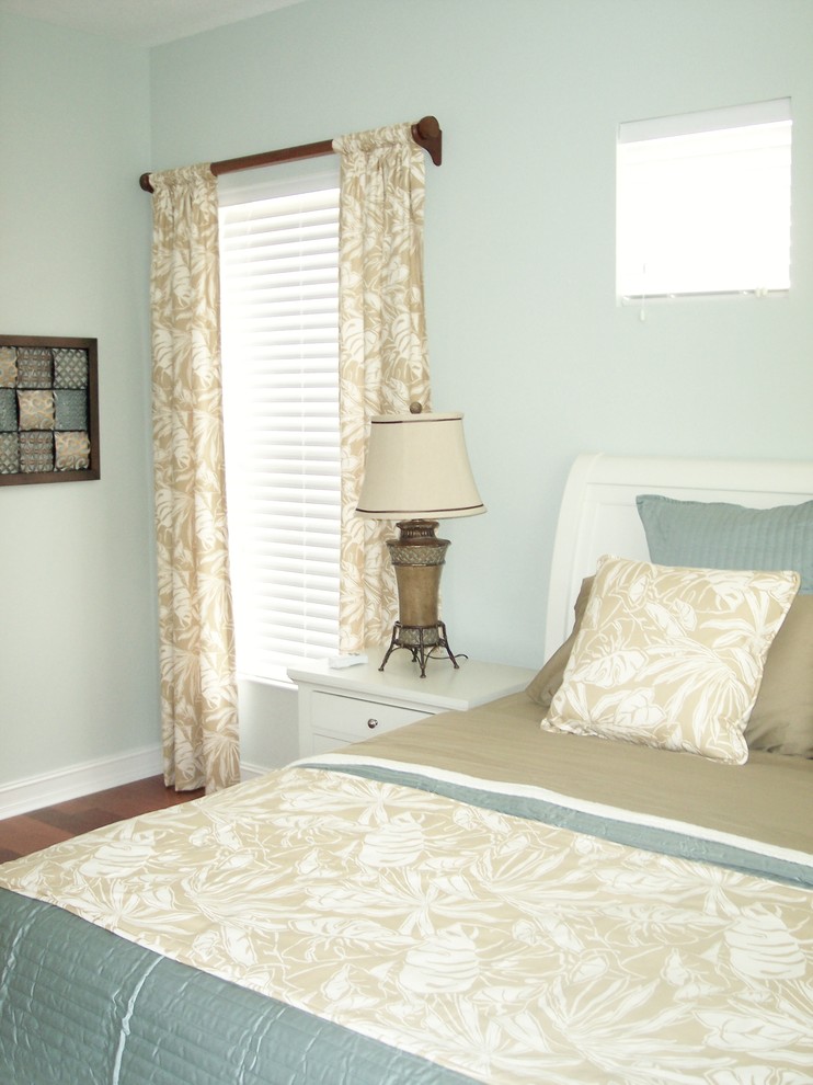 Example of an island style bedroom design in Tampa