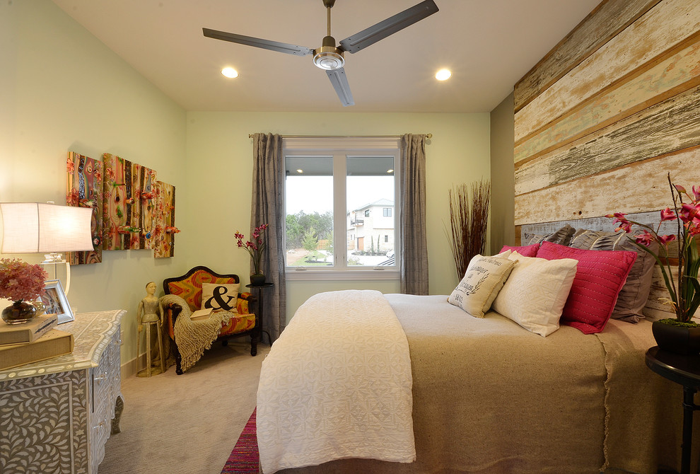 Example of a trendy carpeted bedroom design in Austin with gray walls and no fireplace