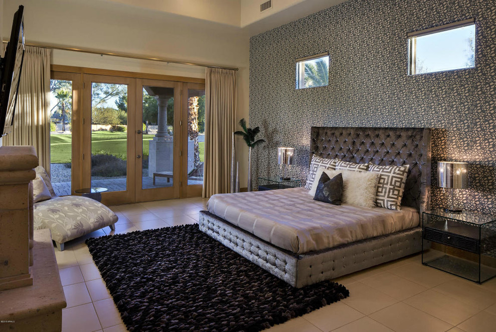 Example of a large trendy master ceramic tile bedroom design in Phoenix with gray walls, a standard fireplace and a stone fireplace