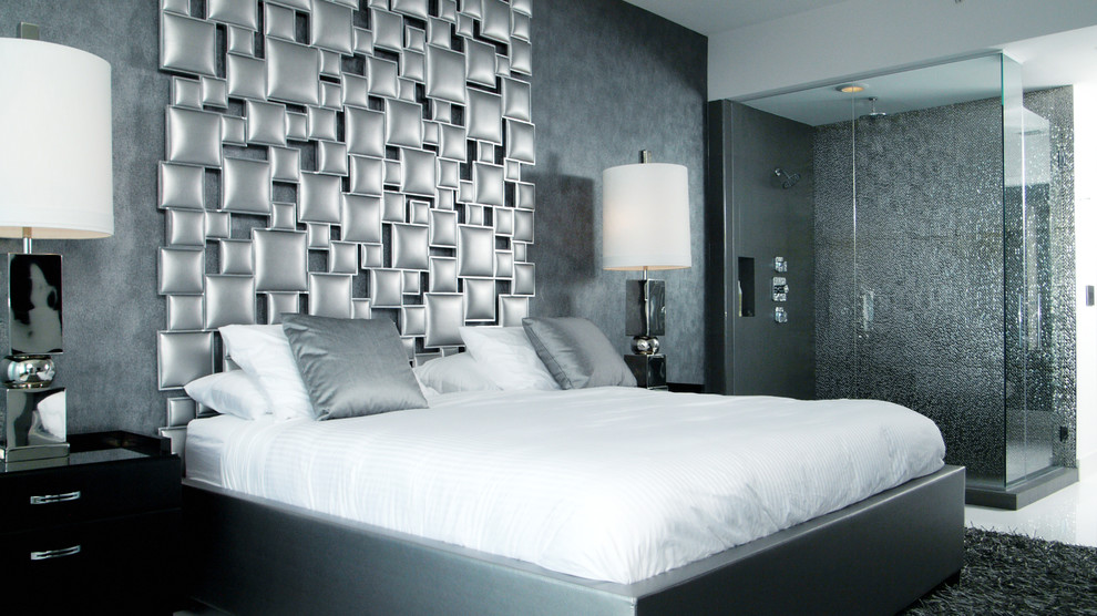 Exempel på ett modernt sovrum, med grå väggar