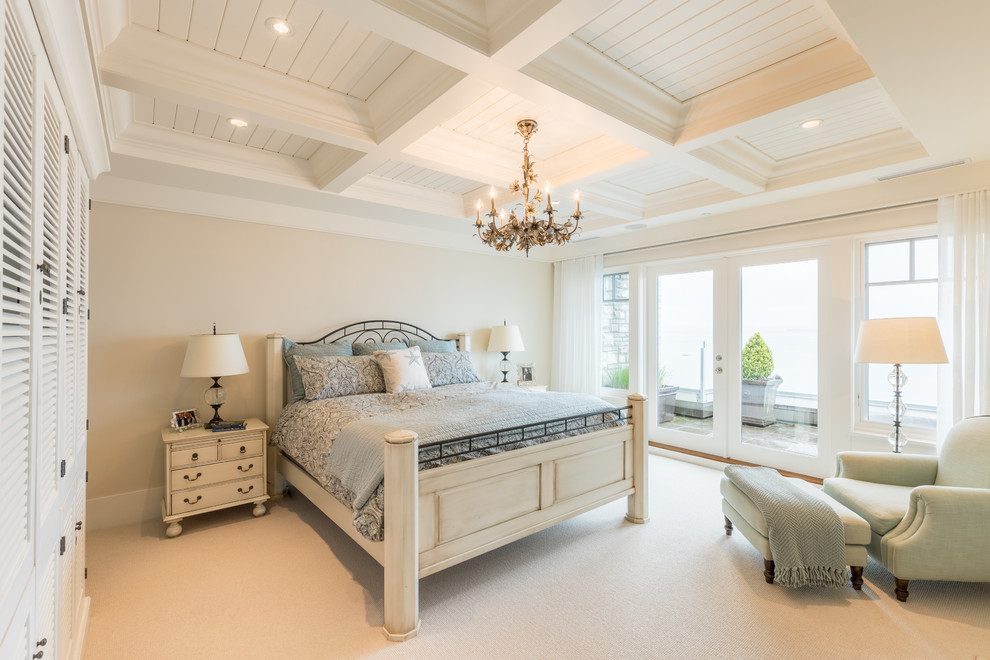 Inspiration for a medium sized classic master bedroom in Vancouver with beige walls, carpet and beige floors.
