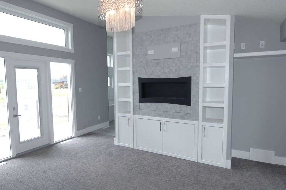 This is an example of a contemporary bedroom in Edmonton with grey walls, carpet, a ribbon fireplace and a tiled fireplace surround.