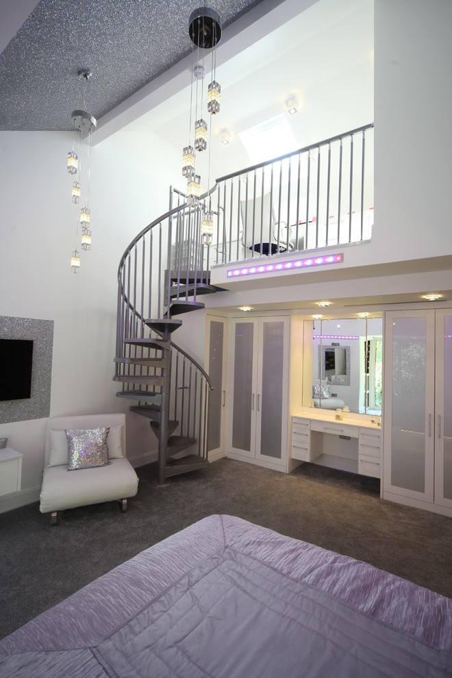 Photo of a large contemporary mezzanine bedroom in Manchester.