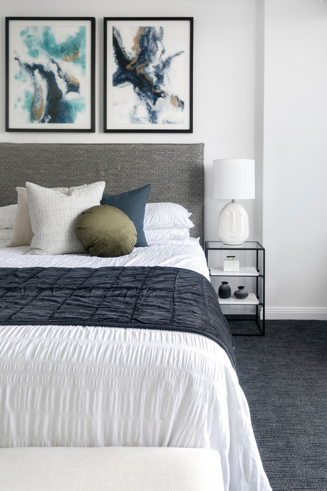 Modernes Schlafzimmer mit grauer Wandfarbe, Teppichboden und grauem Boden in Sydney