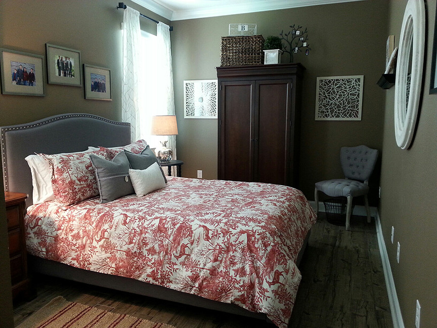 Photo of a medium sized traditional guest bedroom in Orlando with brown walls, porcelain flooring and multi-coloured floors.