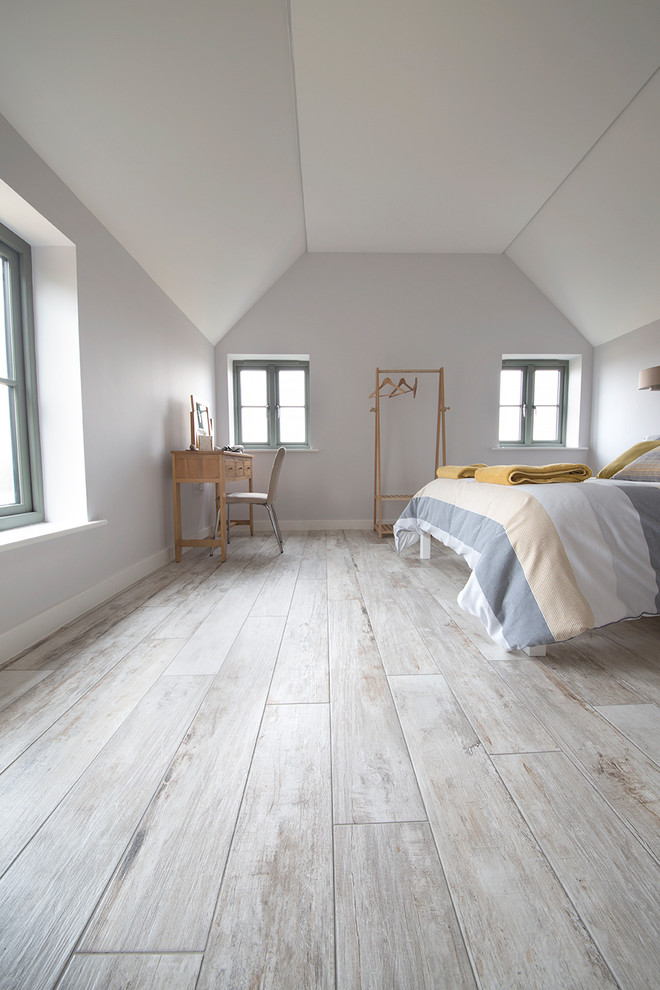 Design ideas for a nautical bedroom in Other with porcelain flooring.