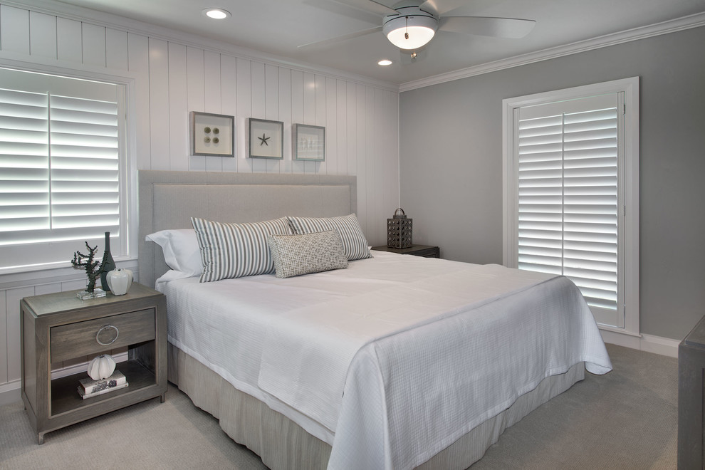 Medium sized contemporary guest bedroom in Miami with grey walls, carpet and no fireplace.