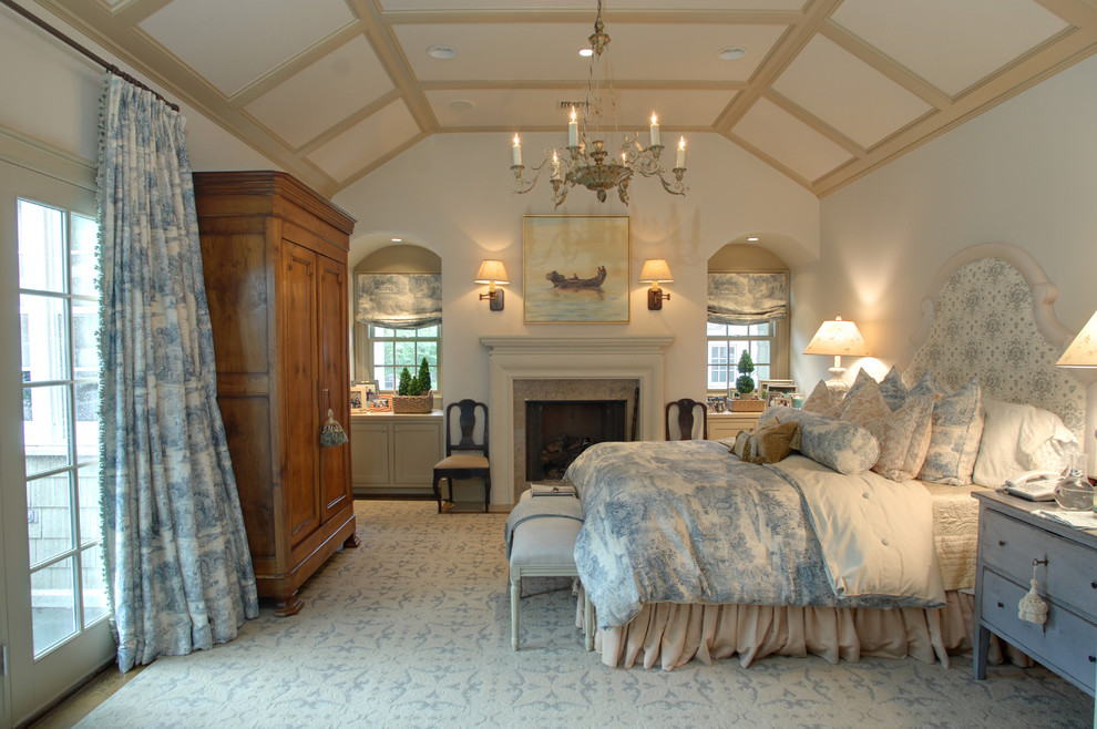 Inspiration for a victorian bedroom in Houston with white walls and a standard fireplace.