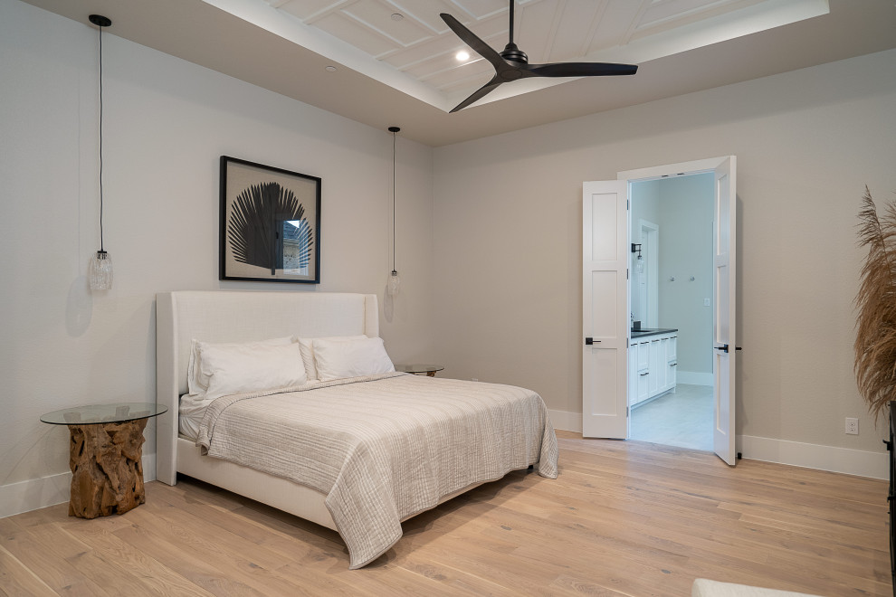 Photo of a medium sized scandinavian bedroom in Dallas with light hardwood flooring and a drop ceiling.