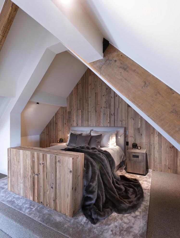 Design ideas for a large rustic guest and grey and brown bedroom in Cheshire with white walls, carpet, no fireplace and brown floors.