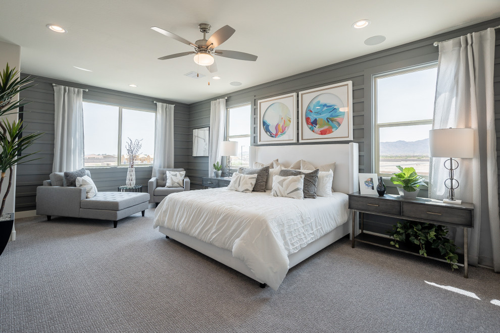 Photo of a large contemporary master bedroom in Phoenix with grey walls, carpet, grey floors and panelled walls.