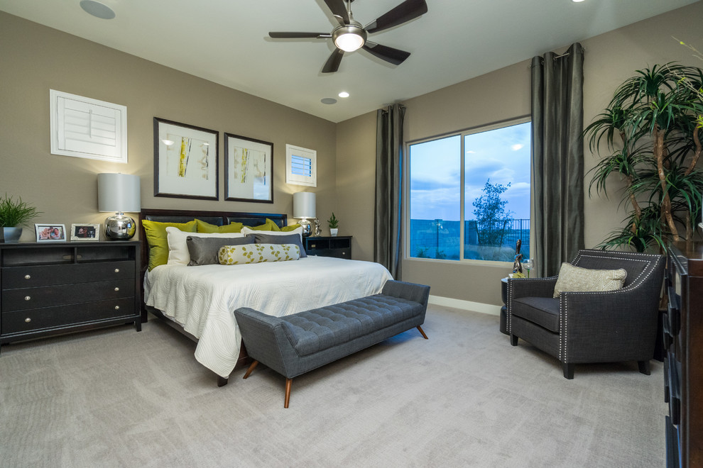 Design ideas for a large contemporary master bedroom in Phoenix with beige walls, carpet and beige floors.