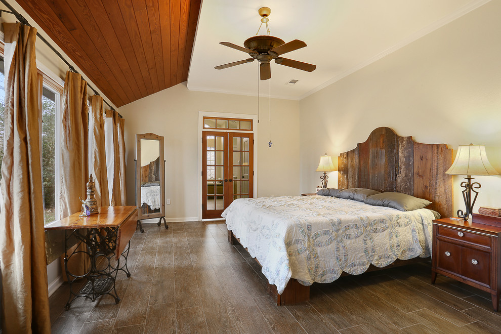 Design ideas for a large classic master bedroom in New Orleans with white walls, porcelain flooring and grey floors.