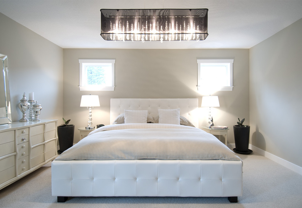 Example of a minimalist carpeted bedroom design in Vancouver with beige walls