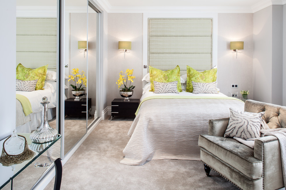 This is an example of a contemporary grey and silver bedroom in London.