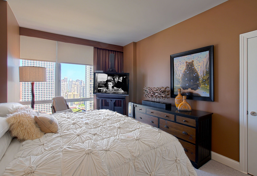 Mid-sized trendy guest carpeted and beige floor bedroom photo in Chicago with multicolored walls and no fireplace