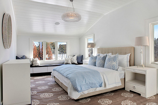 Photo of a large modern master bedroom in Newark with white walls and carpet.