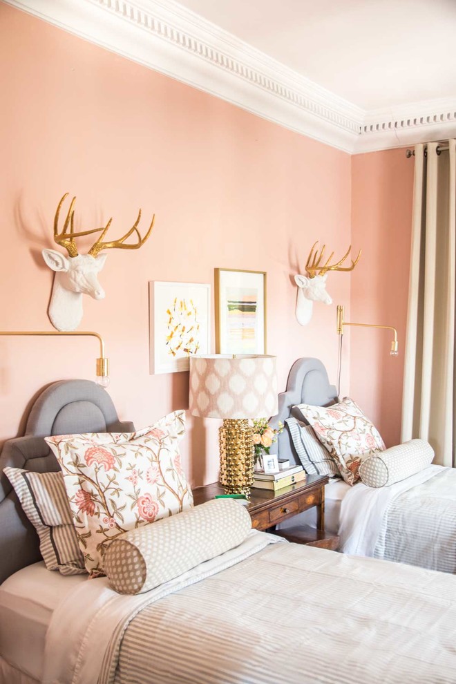 Example of a mid-sized eclectic guest bedroom design in Atlanta with pink walls