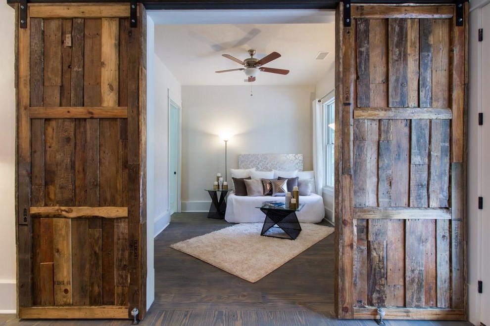 Bedroom - small rustic guest dark wood floor bedroom idea in Atlanta with white walls