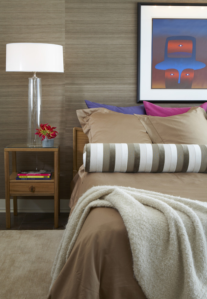 Example of a minimalist bedroom design in Atlanta with brown walls