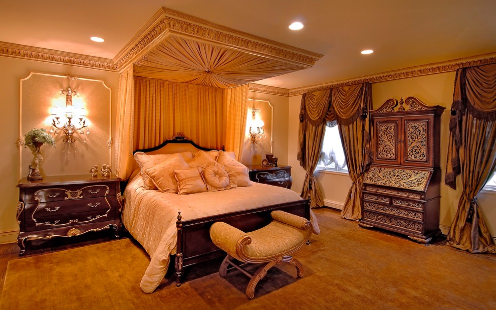 Bedroom - mid-sized traditional master medium tone wood floor and brown floor bedroom idea in New York with beige walls and no fireplace