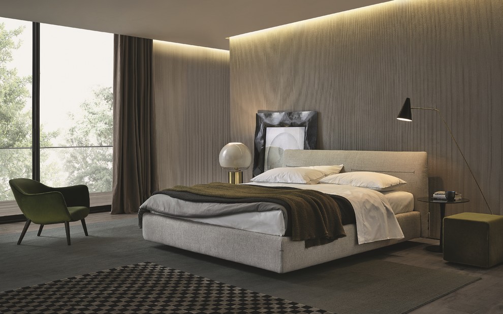 Inspiration for a large modern master carpeted and gray floor bedroom remodel in New York