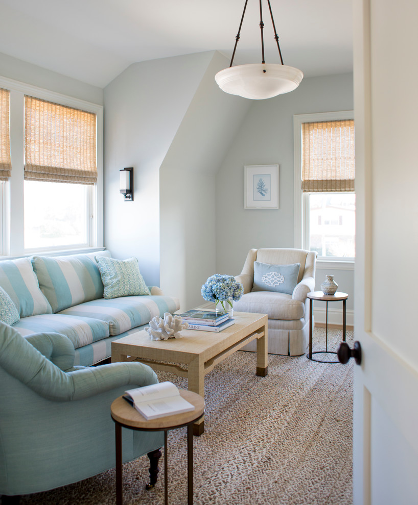 Inspiration for a medium sized coastal mezzanine bedroom in Jacksonville with blue walls and dark hardwood flooring.