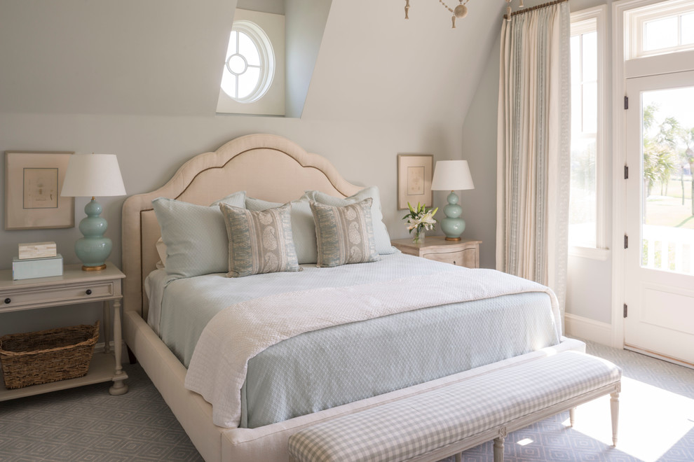 Inspiration for a large beach style guest bedroom in Jacksonville with blue walls.