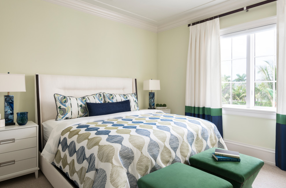 Photo of a medium sized traditional guest bedroom in Other with green walls, carpet and beige floors.