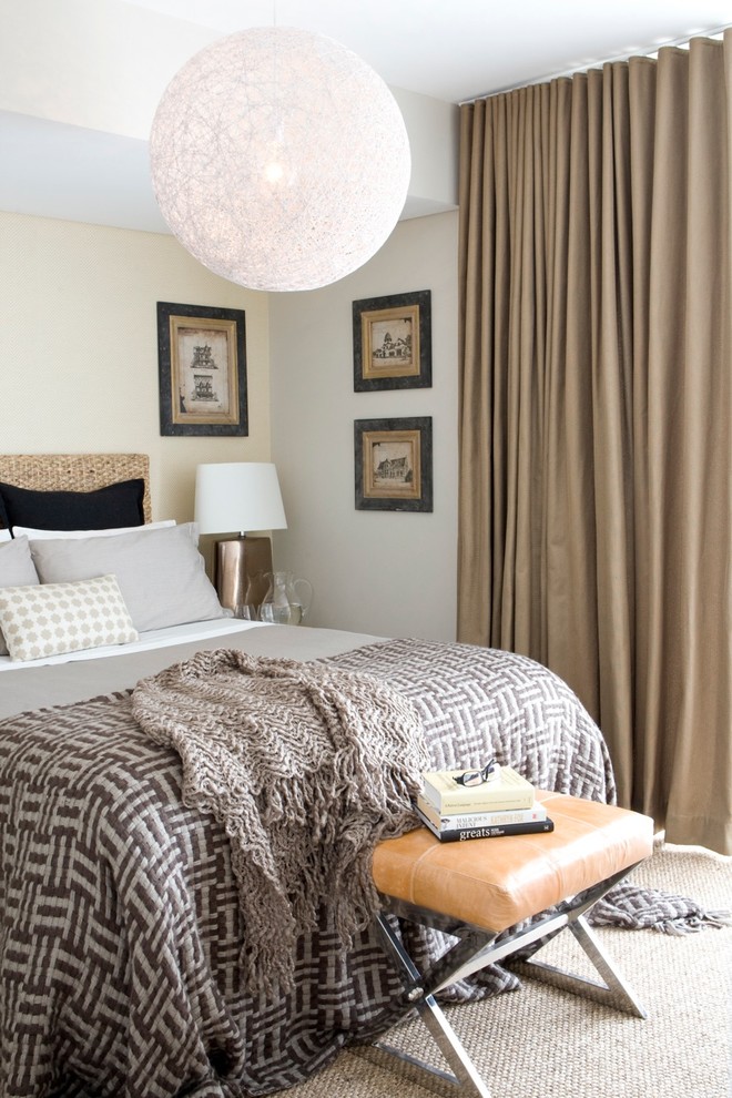 Elegant bedroom photo in Sydney with beige walls