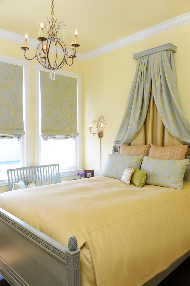 Elegant bedroom photo in San Francisco with yellow walls