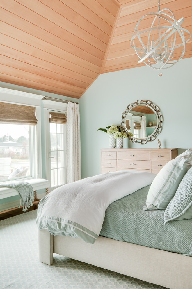 Réalisation d'une chambre marine avec un mur vert et un sol bleu.