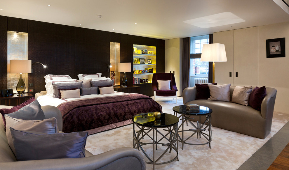 Inspiration for a large contemporary master bedroom in London.