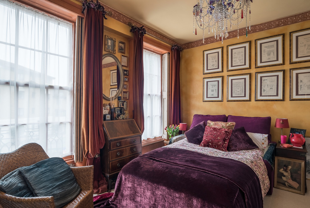 This is an example of an eclectic bedroom in Surrey with yellow walls.