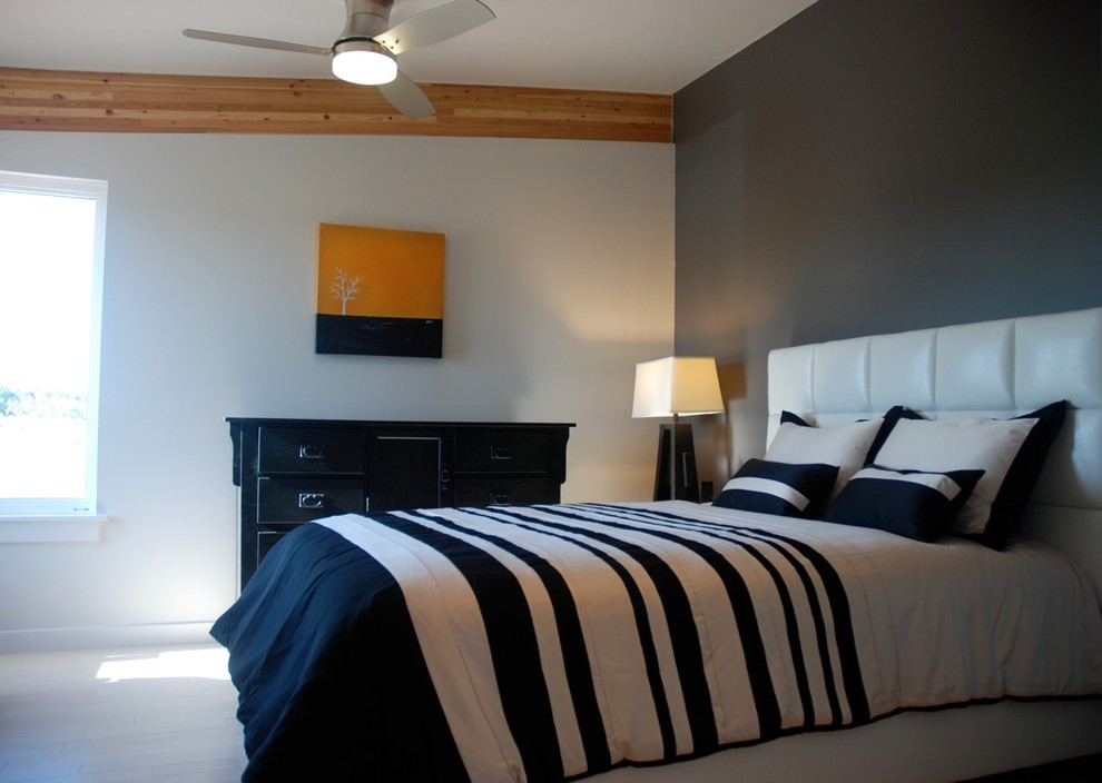Inspiration for a medium sized contemporary master bedroom in Vancouver with white walls.