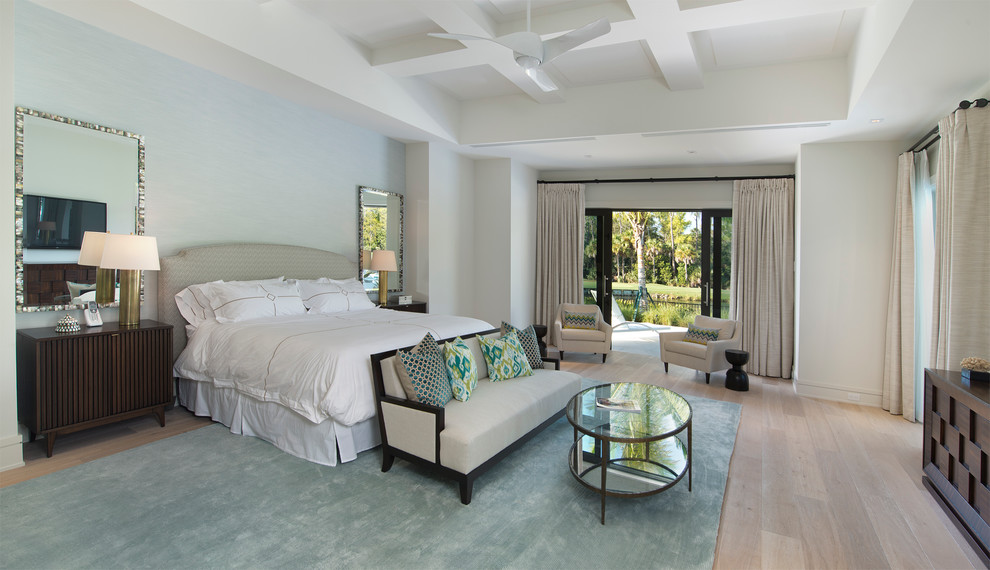 Large transitional master light wood floor and beige floor bedroom photo in Miami with white walls and no fireplace
