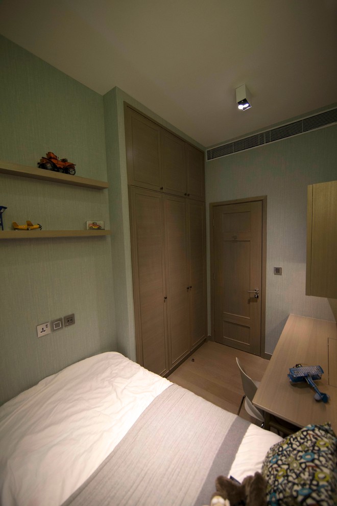 Example of a trendy bedroom design in Hong Kong