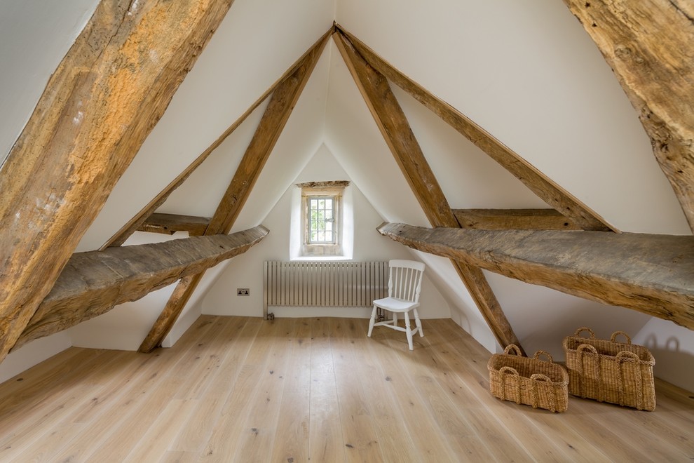 Photo of a bedroom in Gloucestershire with white floors.