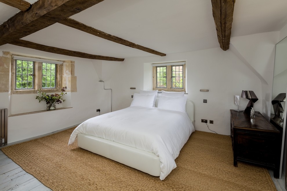 Inspiration for a bedroom in Gloucestershire with white floors.