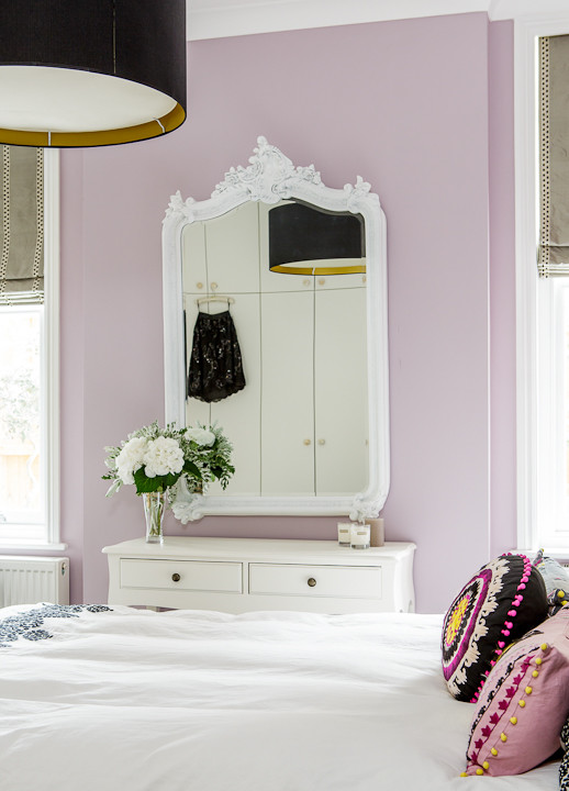 Cottage chic bedroom photo in London