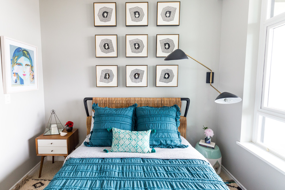Bohemian grey and teal bedroom in Austin with grey walls and no fireplace.