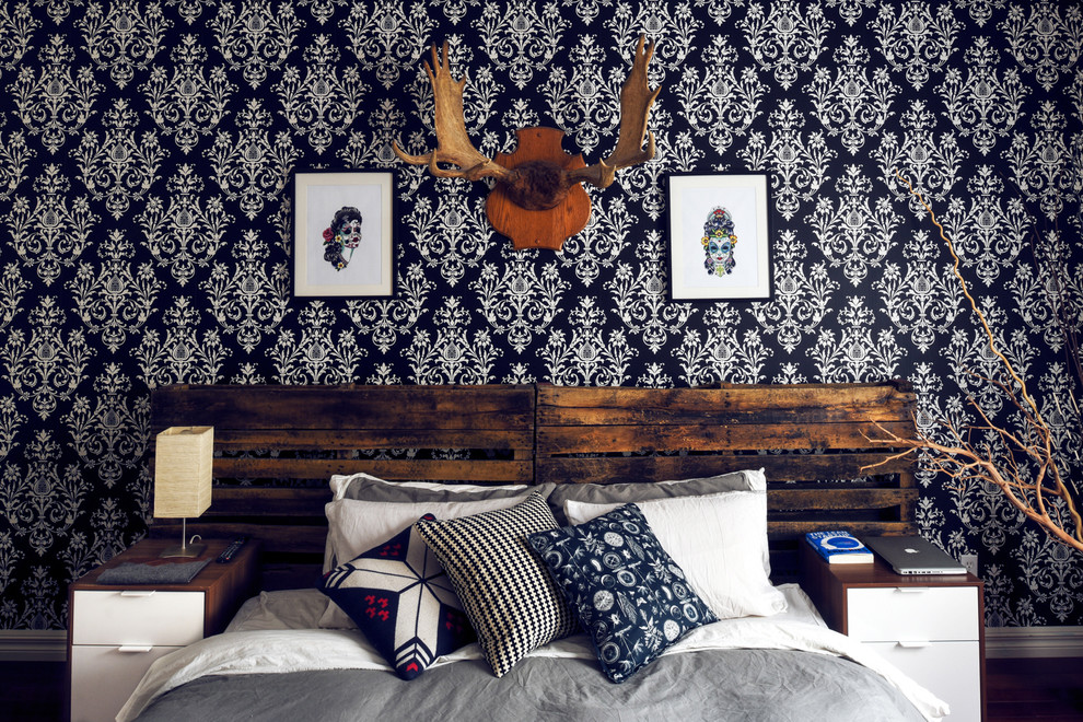 Example of an eclectic bedroom design in Montreal with multicolored walls