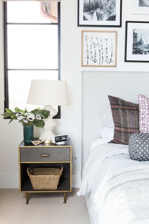 Inspiration for a mid-sized eclectic guest carpeted and beige floor bedroom remodel in Salt Lake City with white walls