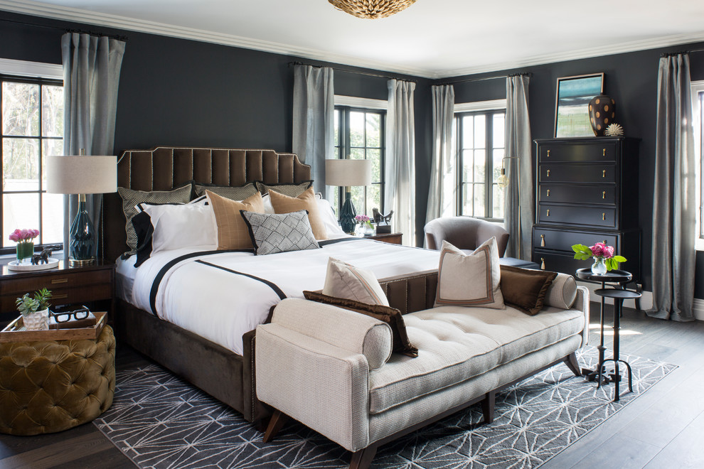 Huge transitional master dark wood floor and brown floor bedroom photo in Los Angeles with black walls and no fireplace
