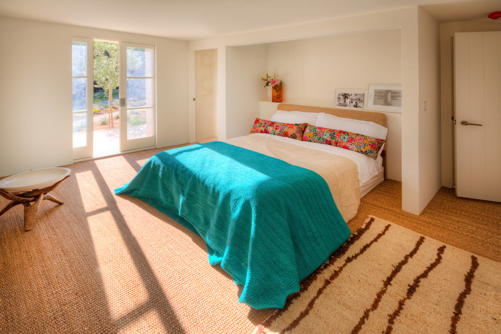 Tuscan carpeted bedroom photo in Santa Barbara with beige walls