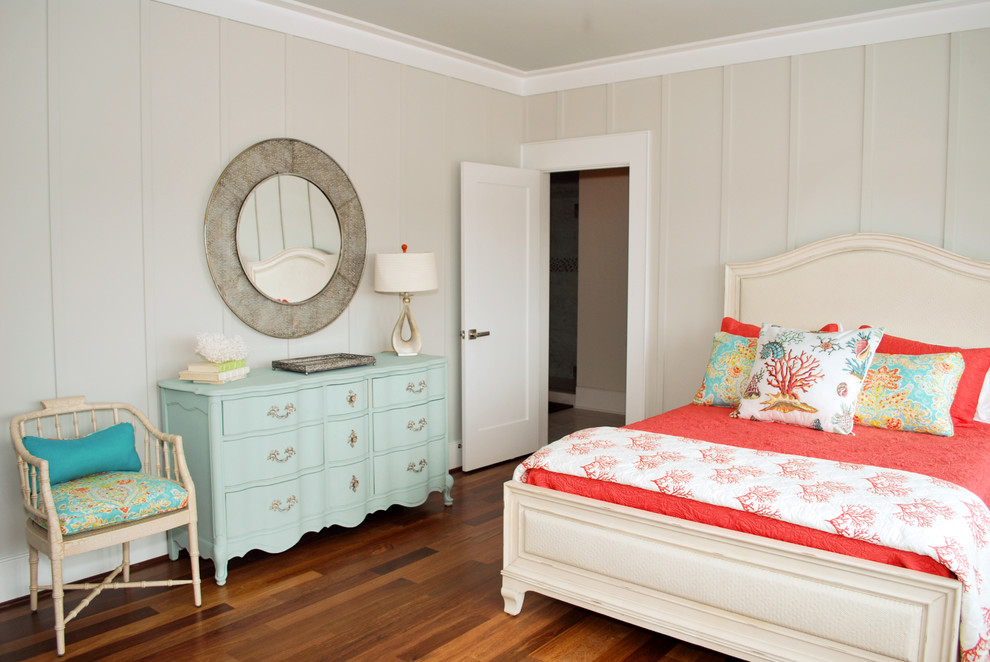 Beach style medium tone wood floor bedroom photo in Charleston with beige walls