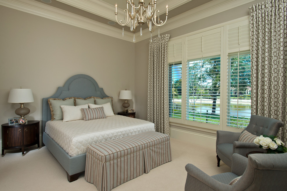 This is an example of a traditional guest bedroom in Other with grey walls and carpet.