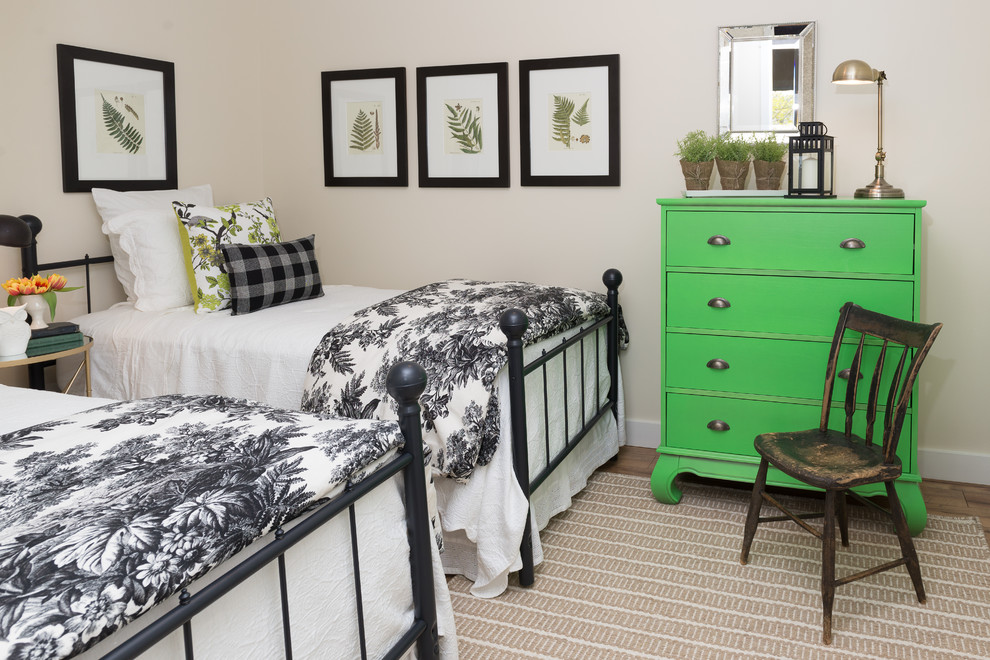 Example of a beach style dark wood floor bedroom design in Ottawa with beige walls