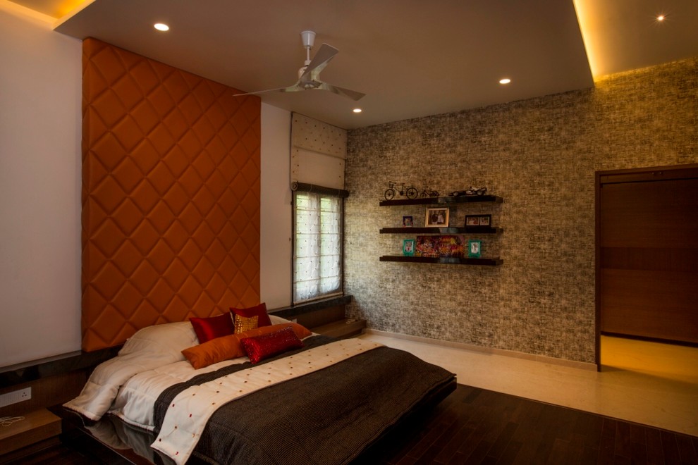 Photo of a contemporary bedroom in Bengaluru.